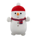 Squishmallows Hugmees 25 cm - Manny a hóember piros sapkában és sállal